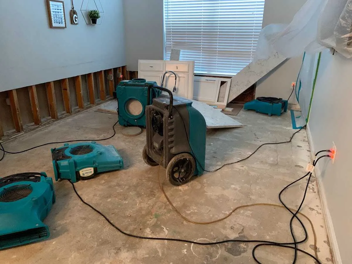 Dehumidifier in flood-cut room for Water Damage Restoration in Belle Haven